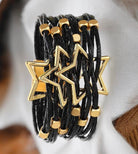 LUCKY STARS Bracelet by Teal Tiger Boutique $14.00 Elegant black woven bracelet featuring a magnetic clasp and a stunning gold colored star design. Teal Tiger Boutique