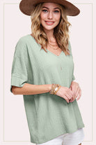 Thinking About You Top (Sage) – Trendy Boutique Blouse by La Miel $34.00 Discover comfort and style with our boutique sage blouse. Perfect loose fit with v-neckline and unique woven airflow design for a trendy, relaxed look. Teal Tiger Boutique