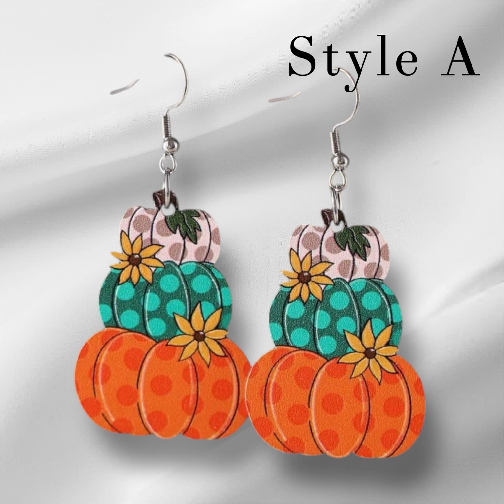 Stack O Pumpkins Earrings in vibrant colors, featuring three stacked pumpkins with floral accents, perfect for autumn style.