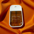 ASHLEY LAURA XL CARAMEL HAND SANITIZER in a stylish bottle with a sweet caramel scent and antibacterial protection.