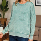 SKYLINE CREW (Dusty Teal) pullover with a pocket, showcasing a halo-washed texture for modern style.