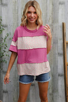 Weekend Ready fuchsia floral wavy rib pullover with color block design, worn with denim shorts for chic styling.