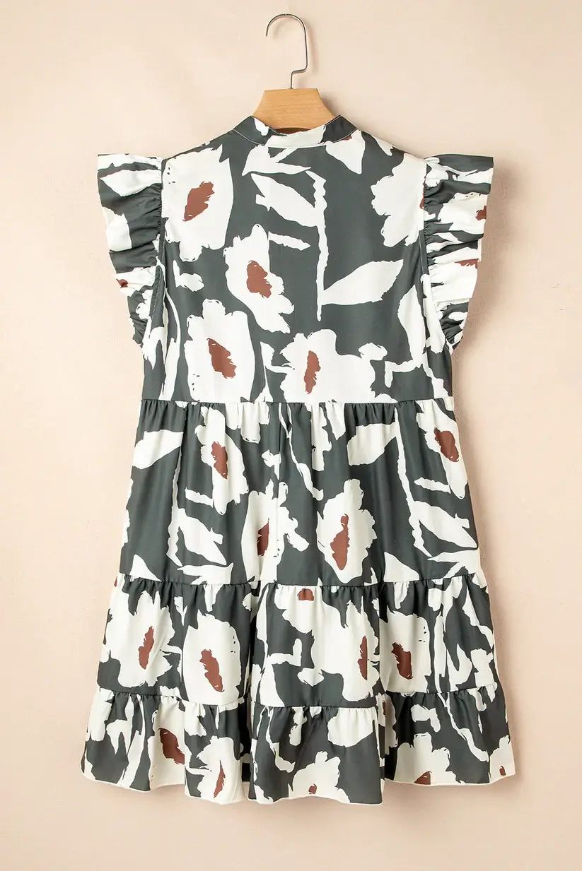 Woodland Walks Dress featuring floral print, flutter sleeves, and a tiered design in forest green.