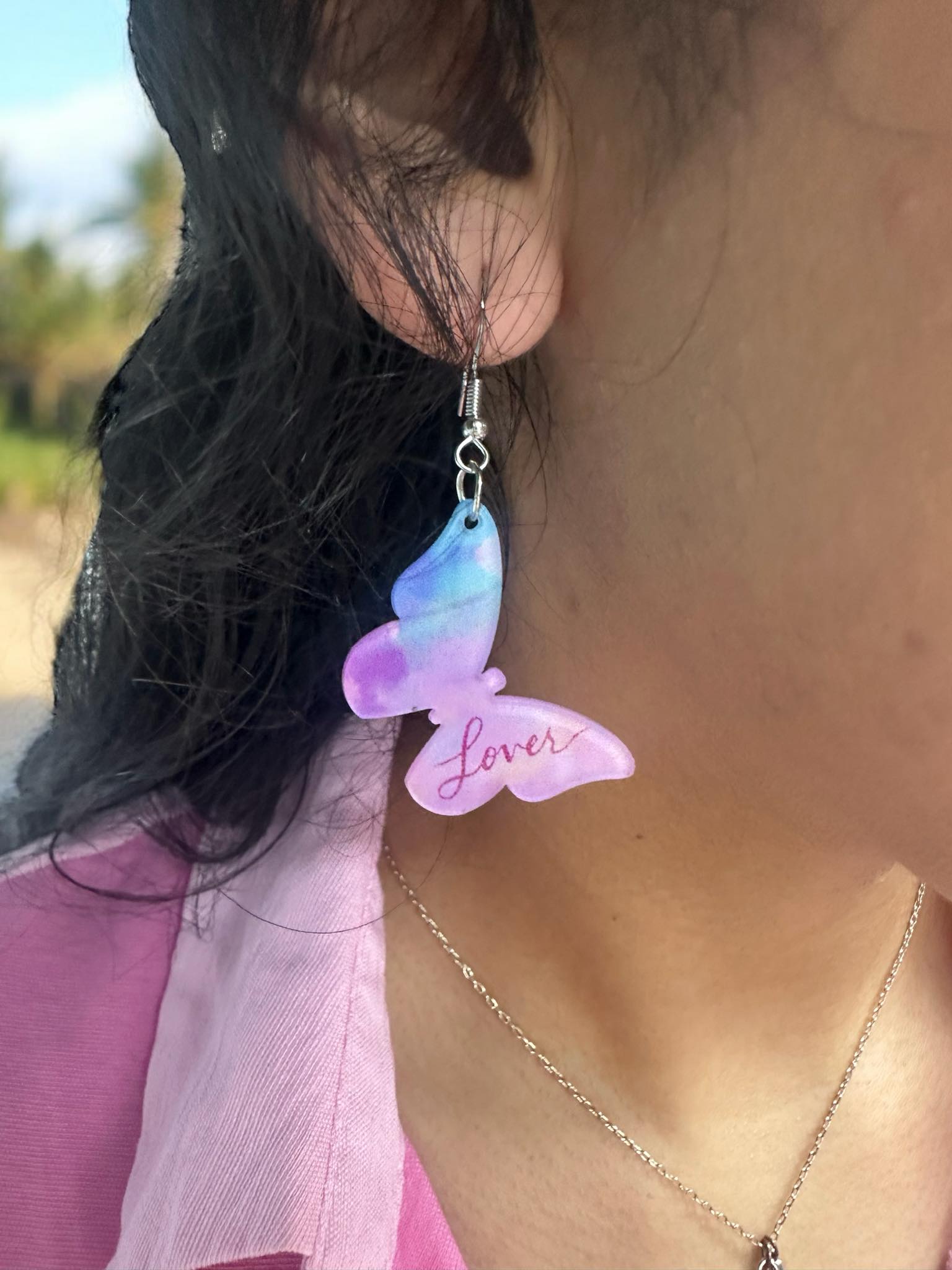 Stunning Lover Era Butterfly earrings in colorful acrylic, 1.75" long, perfect for stylish statement looks.