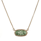 Green druzy oval pendant necklace with textured stone and gold chain for elegant style.