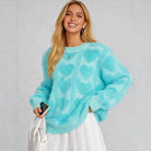 LOVE AT FIRST SIGHT SWEATER in vibrant blue with heart pattern, cozy faux mink pullover perfect for Valentine's Day.