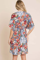 Back view of floral DA1475 wrap V-neck midi dress in soft fabric, showcasing relaxed fit and vibrant colors.