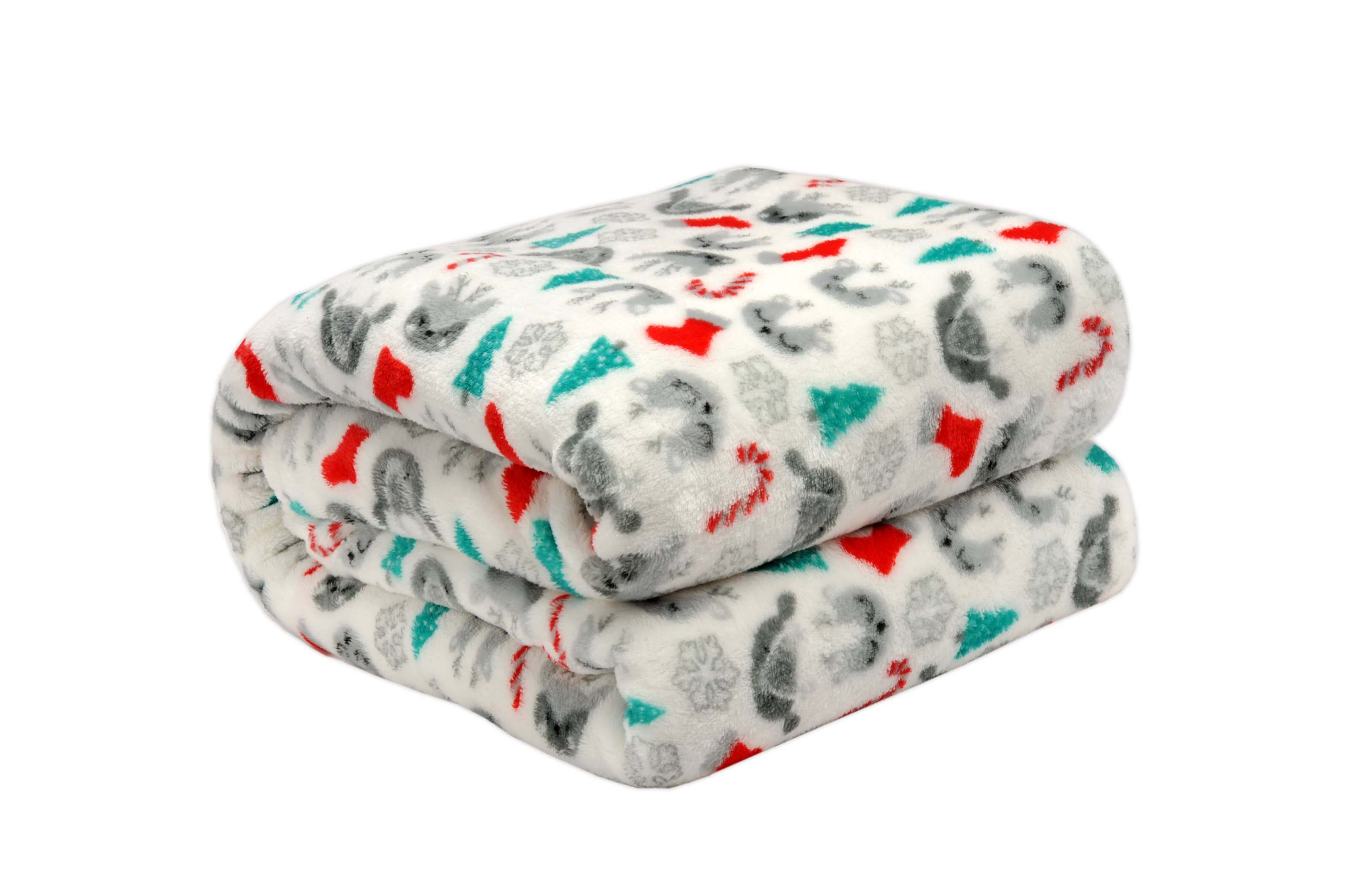 Christmas Cheer Plush Throw Blanket by Kathy Ireland with festive design, made of soft flannel fleece, folded on a white background.