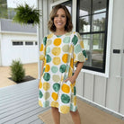 ON THE DOT DRESS - Umgee featuring vibrant yellow and green dot print with bubble sleeves and side pockets.