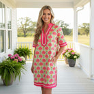 MY HAPPY PLACE DRESS - She + Sky displayed on a model in a chic outdoor setting, featuring a bold fan-inspired print.