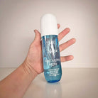 SCENT STORY by Solo En Ibiza Barcelona Bliss fragrance body mist in a person's hand.
