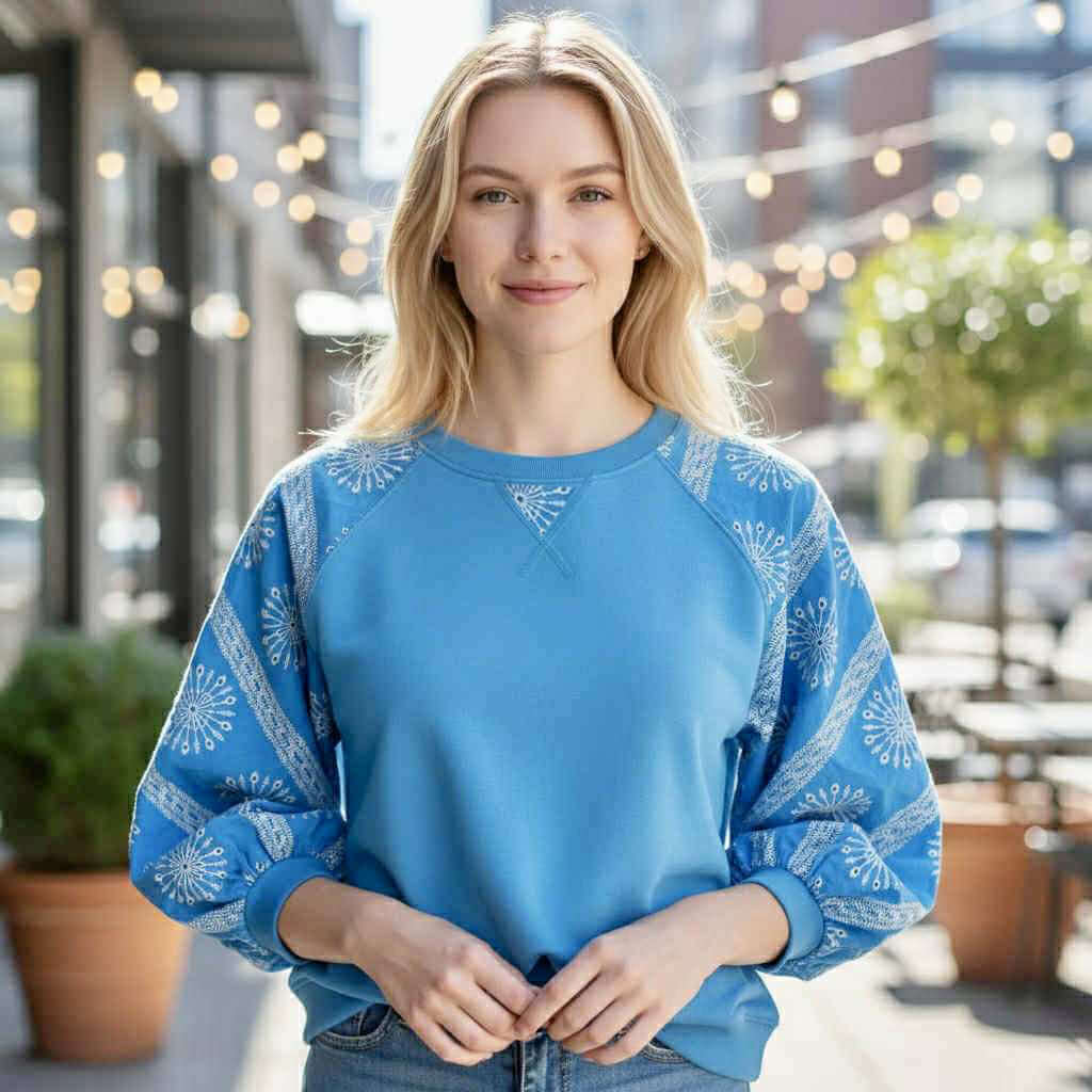 Model wearing AZURE AVENUE TOP- - Umgee in sky blue with patterned 3/4 sleeves, perfect for casual outings.