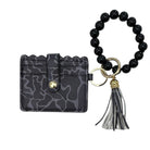 LULU MAC DK CAMO WRISTLET – Dark camo ID wallet with beads and tassel for stylish hands-free convenience.