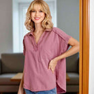 Model wearing the Afternoon Glow Top by Umgee, showcasing its relaxed fit and soft mineral washed cotton fabric.