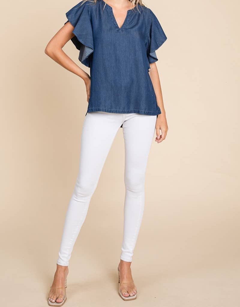 BILOXI BLUES TOP - Trendy Boutique Blouse by Lily Sky by Lily Sky $38.00 Discover comfort and style with the BILOXI BLUES TOP. Trendy chambray denim, v-neck, and flutter sleeves. Shop your size at our boutique today! Teal Tiger Boutique