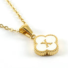 MONOGRAM MOMENTS NECKLACE with gold chain and white monogram pendant showcasing elegance and personal style.