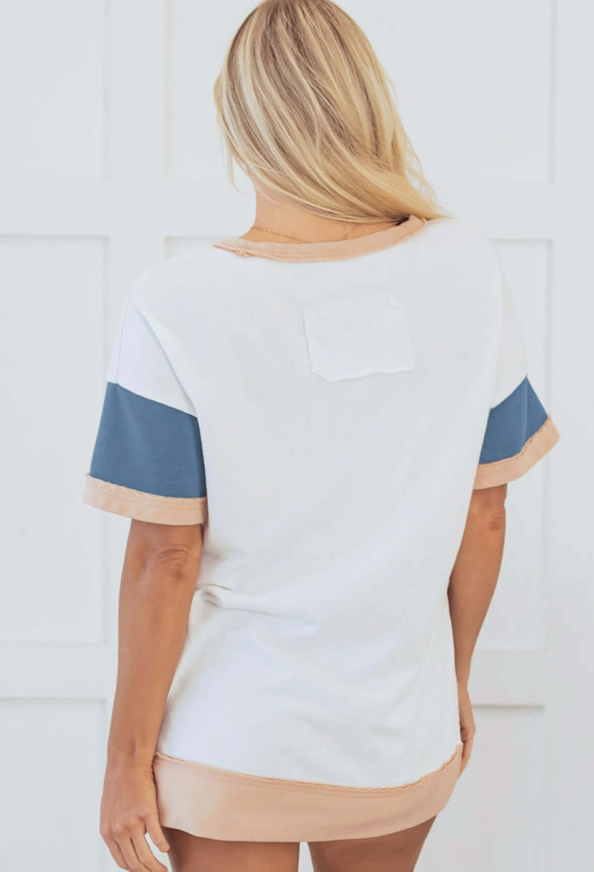 Back view of BOLD MOVES TOP featuring color block design in white, blue, and tan, perfect for casual wear.
