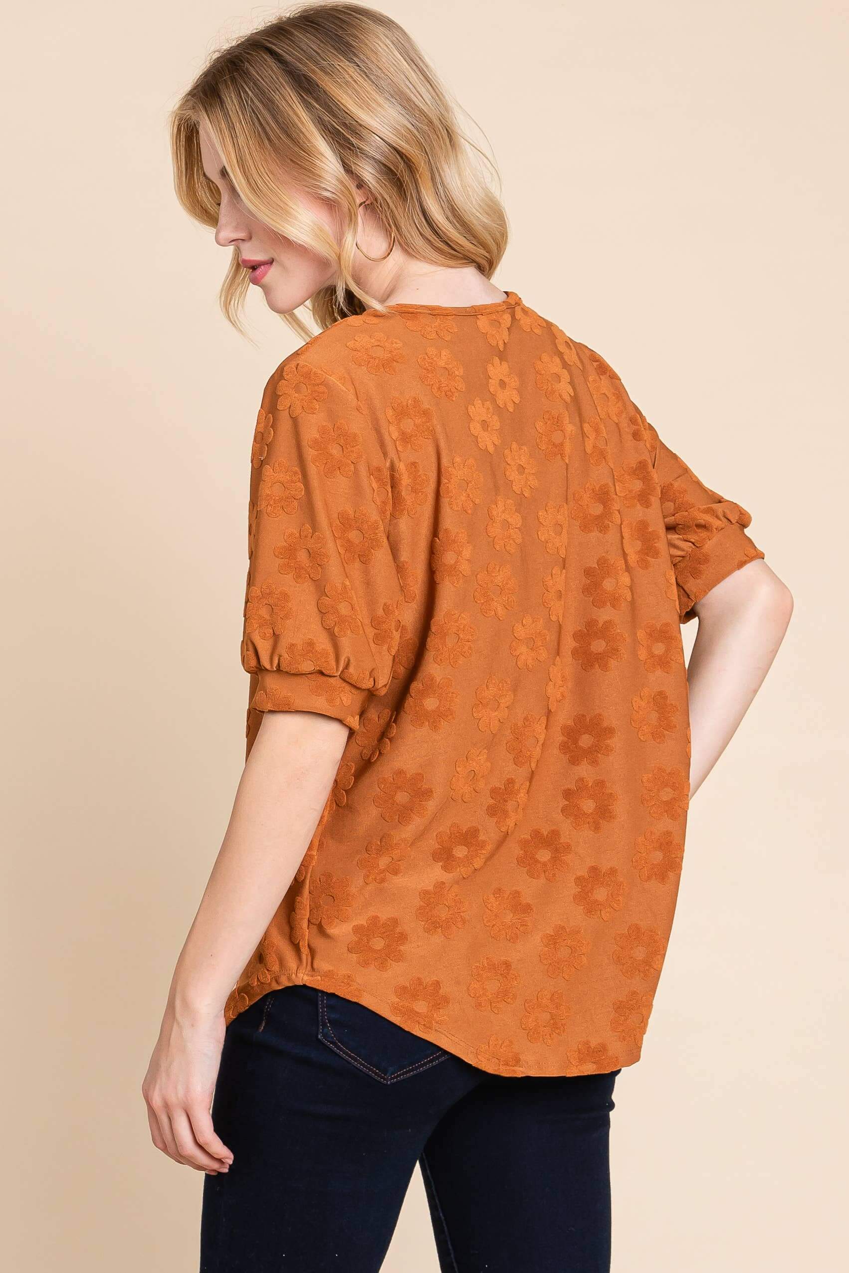 Field of Daisies Top in copper with puff sleeves and daisy embroidery, perfect for spring fashion.