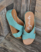 HERO BY VERY G - Teal Wedges for Comfort & Style by Very G $68.00 Discover HERO BY VERY G in teal - trendy, comfy sandals perfect for any adventure. Boutique style with studded details and a 2.25" wedge heel. Runs true to size. Teal Tiger Boutique