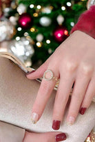 Elegant gold tone CIRCLE UP Cocktail Ring on a hand, featuring sparkling Cubic Zirconia, perfect for holiday style.