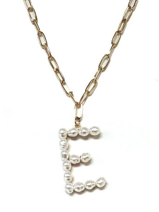 PEARL ESSENCE MONOGRAM NECKLACE by Avenue Zoe with freshwater pearls and gold-tone chain.