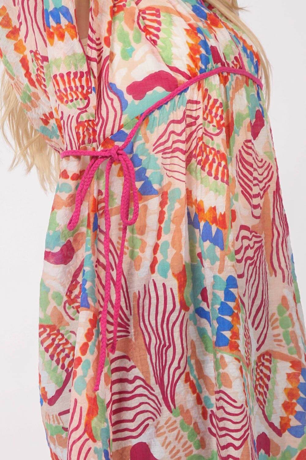 Colorful Island Mirage Beach Dress with vibrant patterns and tie detail, perfect for summer outings.
