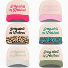 SORRY ABOUT MY HUSBAND HAT (6 colors) - Stylish trucker hats in various colors showcasing fun embroidery.