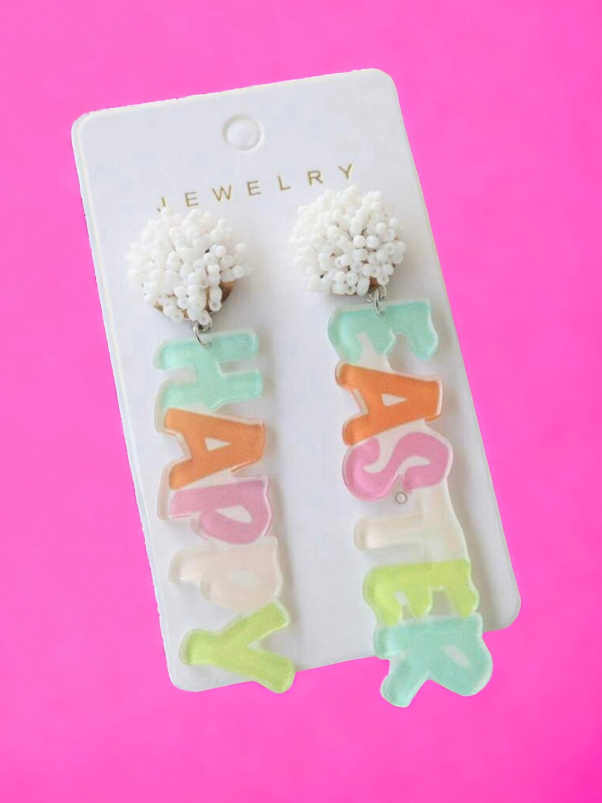 Colorful HOPPY EASTER earrings featuring playful letter design, perfect for spring celebrations and festive outfits.