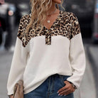 Chic Instincts Top featuring soft, breathable waffle knit and leopard patchwork design, perfect for this weather.