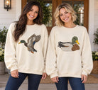 MALLARD MOMENTS (2 STYLES) crewnecks featuring duck designs on women, perfect for casual outings and cool mornings.