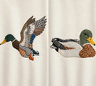 MALLARD MOMENTS (2 STYLES) featuring stitched duck designs: In Flight and Sitting Duck on a crewneck.