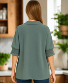 Back view of the Zen Air Top in Jade by Zenana featuring smocked sleeves and airflow design.