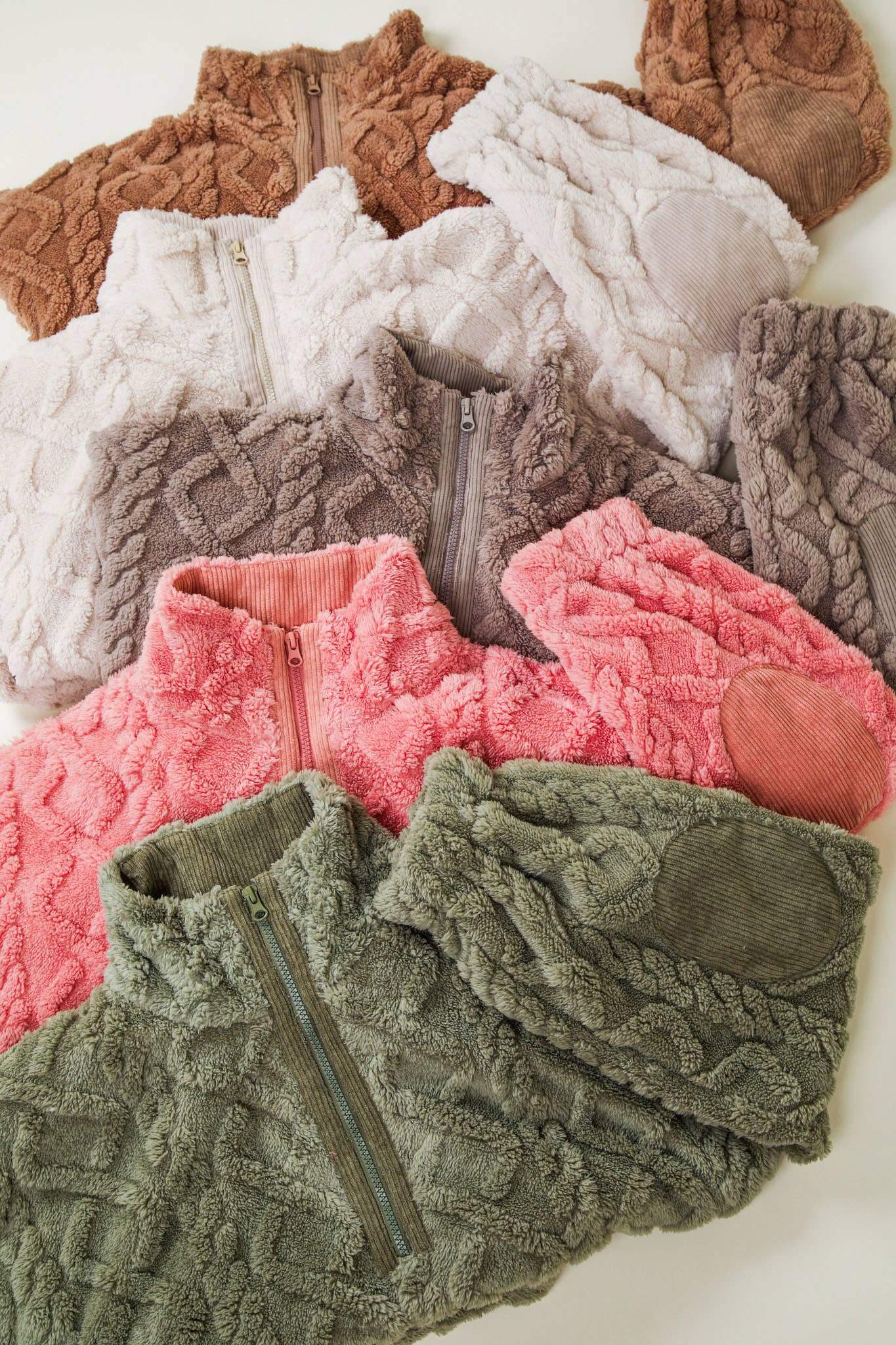 Assorted TEDDY BEAR SHERPA pullovers by Very J featuring cable patterns and corduroy patches in various colors, perfect for cozy style.