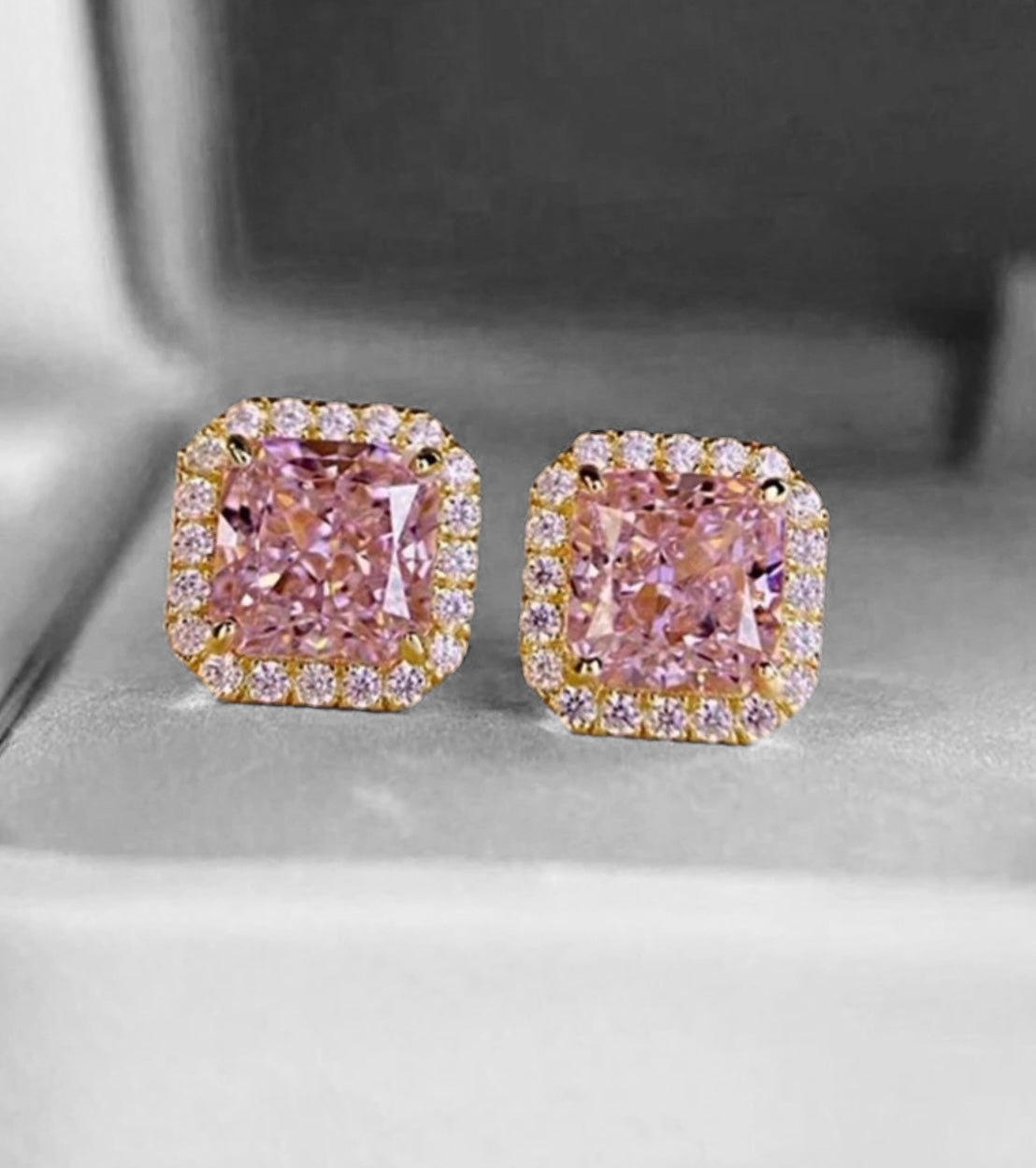 Dazzling pink ice sparkle earrings with rhinestones and cubic zirconia, perfect for any occasion.