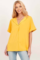 Model wearing a yellow Morning Honey Top with a collared neckline and relaxed sleeves, perfect for casual outings.