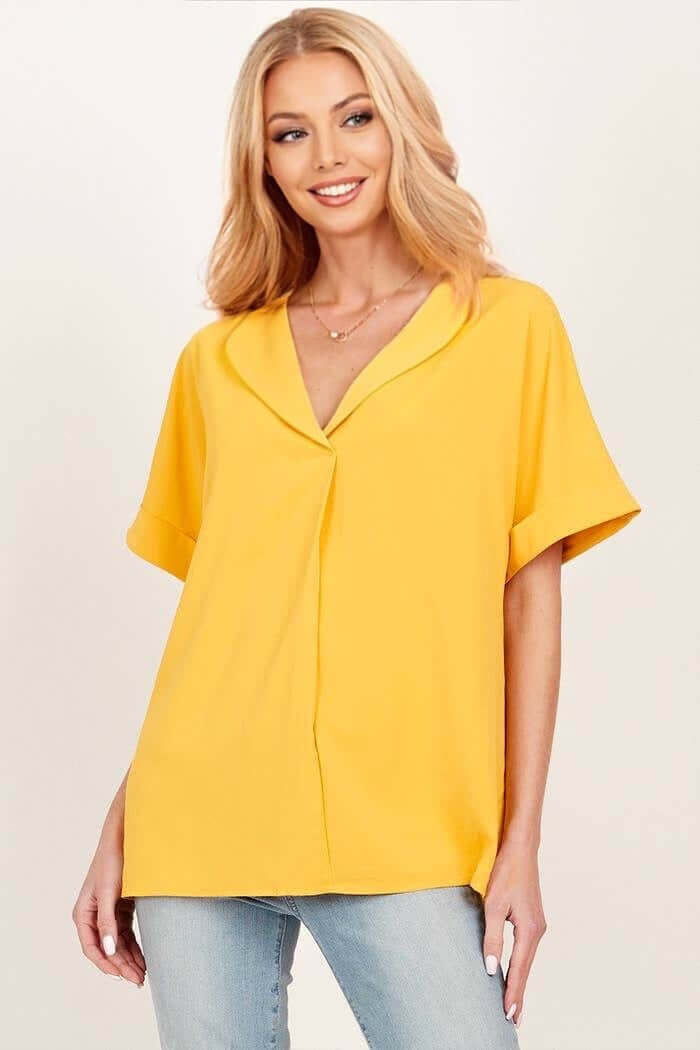 Model wearing a yellow Morning Honey Top with a collared neckline and relaxed sleeves, perfect for casual outings.