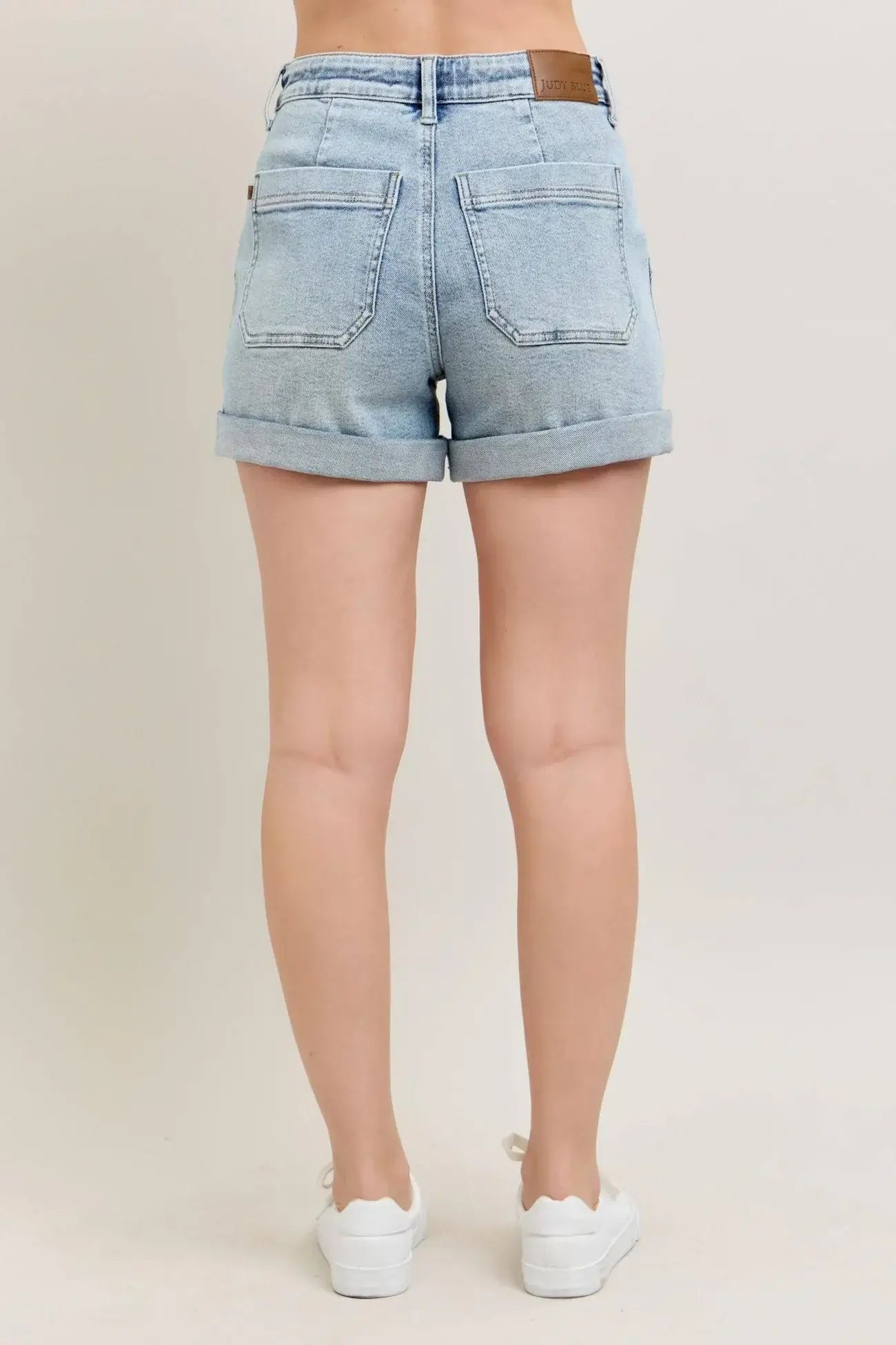Back view of AVA High Waist Cuffed Denim Jogger Shorts by Judy Blue, showcasing soft, stretchy denim and casual style.
