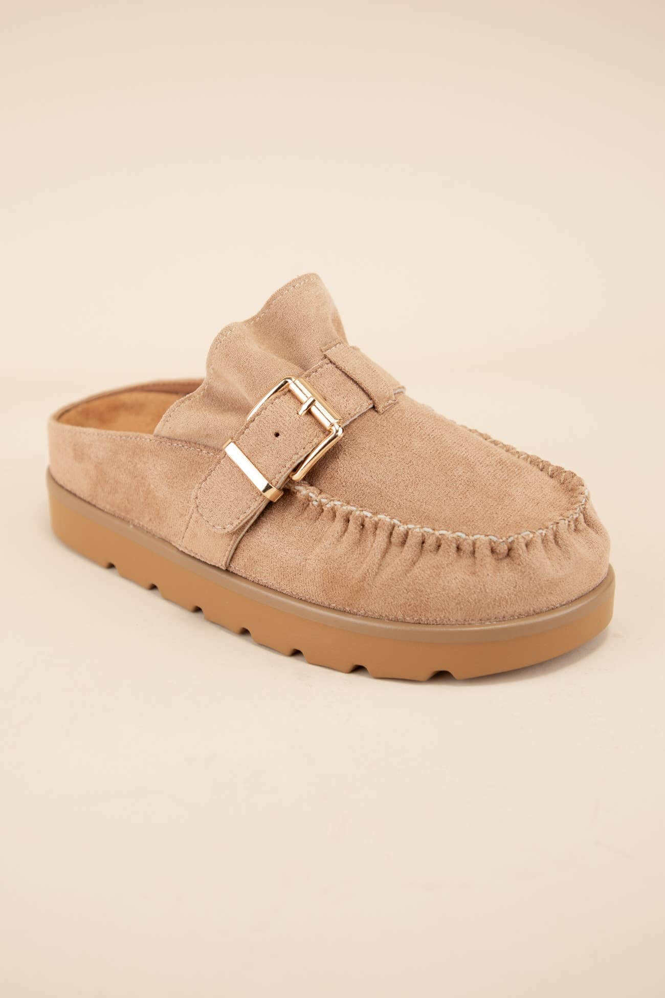 Effy Ruffle Entrance Design Slip-On Moccasin Mule in tan with buckled strap and ruffle detail.