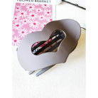 LOVE YOU MORE HAIR CLIPS in matte neutral color, heart-shaped claw clip for stylish hair management.