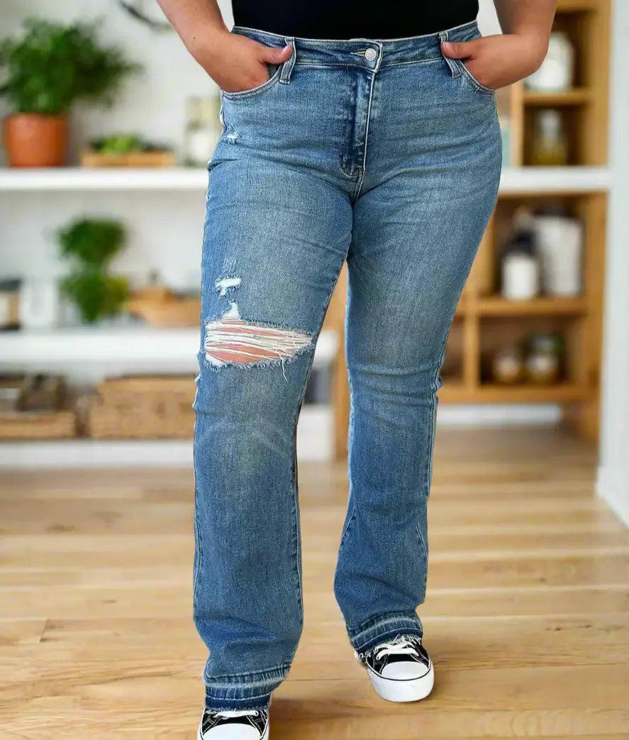 Plus size bootcut Irena jeans by Judy Blue, featuring distressed detailing and a comfortable fit.