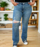 Plus size Judy Blue Irena bootcut jeans featuring distressed details and a stylish fit, perfect for any casual outfit.