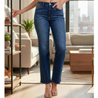 JUDY BLUE - NOELLE JEANS featuring a high-rise fit and wide leg straight cut in deep dark wash denim for a chic look.