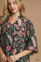 Model wearing FOREVERMORE TOP - Umgee, a floral blouse featuring puff sleeves and a v-neckline, perfect for various occasions.