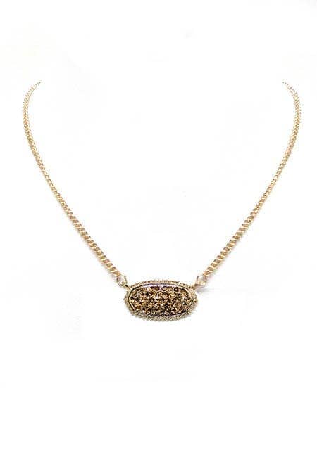Druzy oval pendant necklace featuring a textured stone on a delicate gold chain, perfect for elegant occasions.