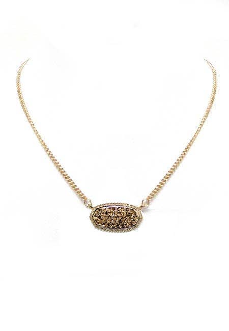 Gold druzy oval pendant necklace with textured stone on a delicate chain.