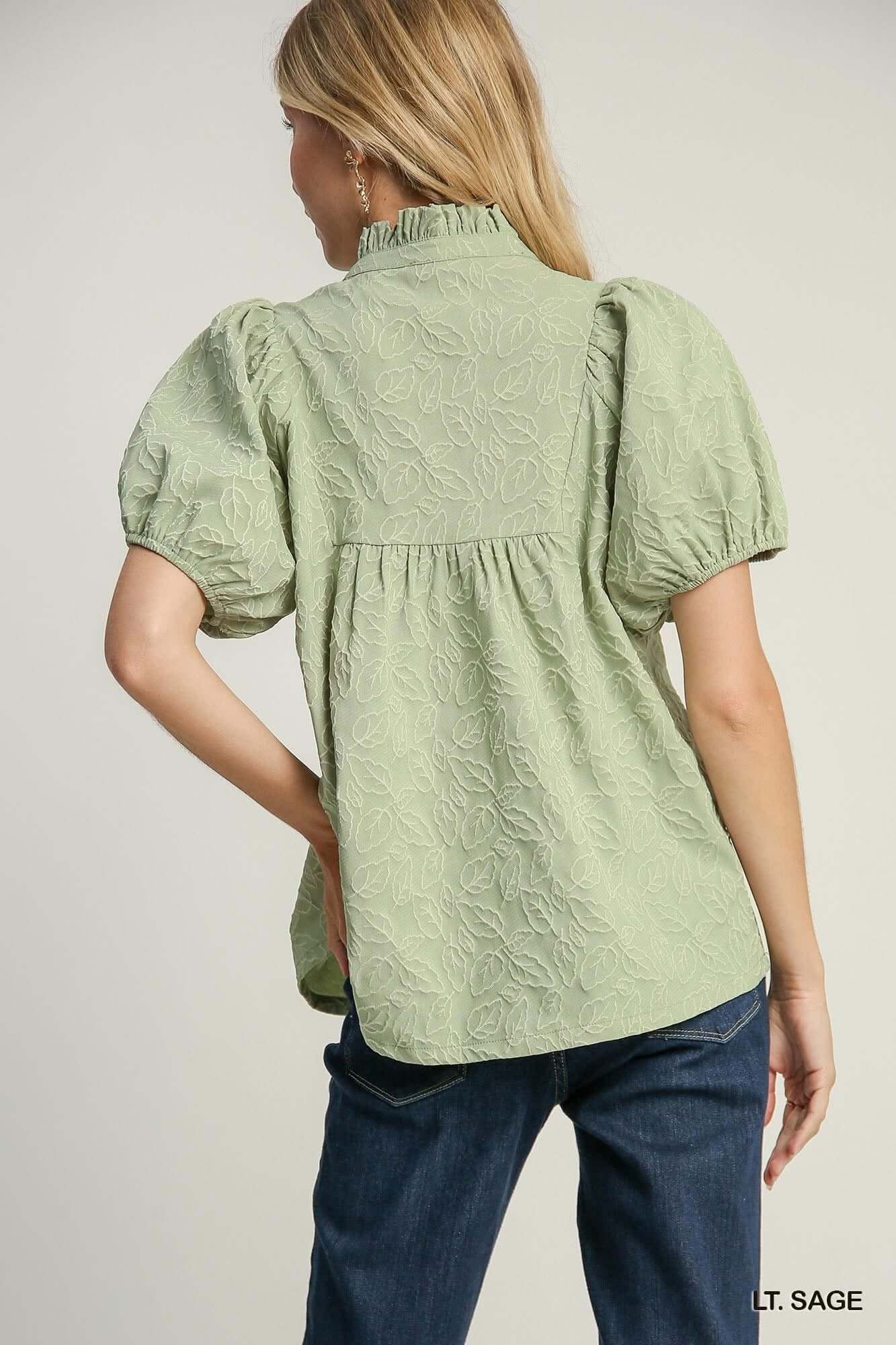 Light sage top with floral trim and leaf jacquard print, perfect for stylish spring to fall outfits.