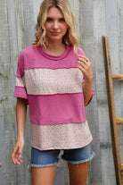 Weekend ready floral wavy rib pullover in fuchsia, color block design paired with denim shorts.