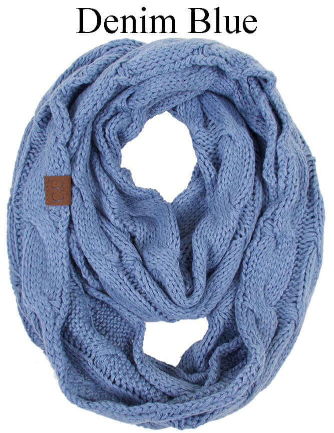 C.C Story Book knitted infinity scarf in Denim Blue color, featuring cozy cable knit design.