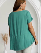 Back view of Umgee's Glorious Feeling top in jade, featuring a trendy frayed hem and relaxed fit.