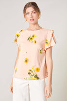 DAISY MARIE TOP from SugarLips, featuring sunflower print and ruffle detail in blush yellow.